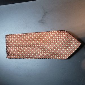 Burnt orange tie with light green and blue accents